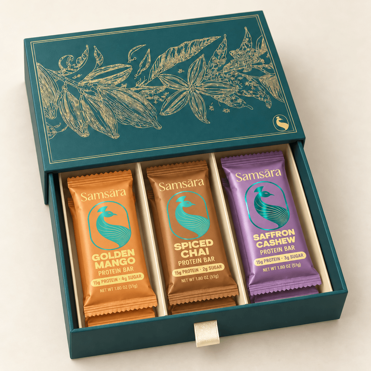 Holiday gift box with Mango, Chai, and Saffron Cashew bars